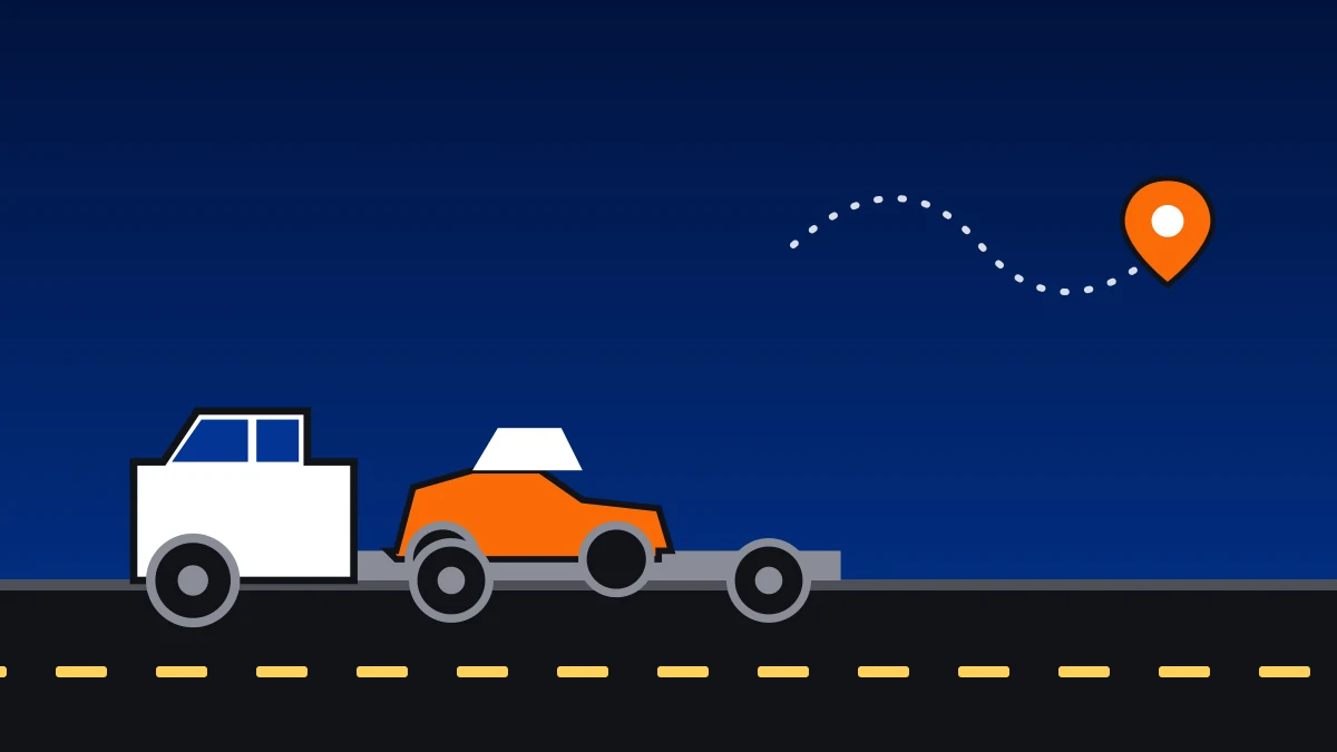 Carro sendo carregado em prancha de transporte para viagem entre estados